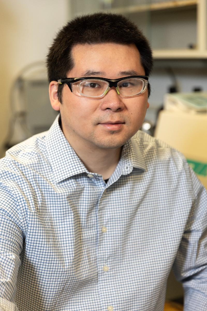 Yang Yang portrait in lab with safety eyewear 