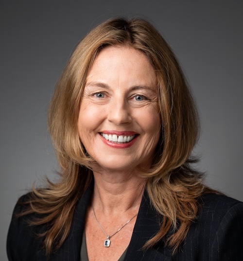 A professional headshot of Dean Shelly Gable