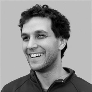 A headshot of Professor Andrea Young in black and white