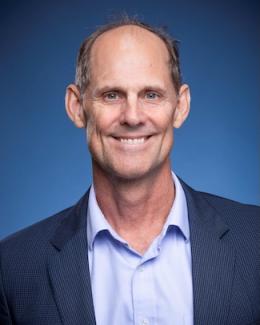 Professional headshot of Alan Murray